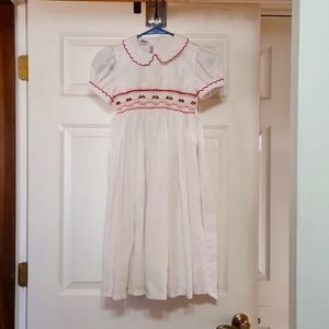 Pervenche Hand Embroidered little girls dress white with strawberry smocking